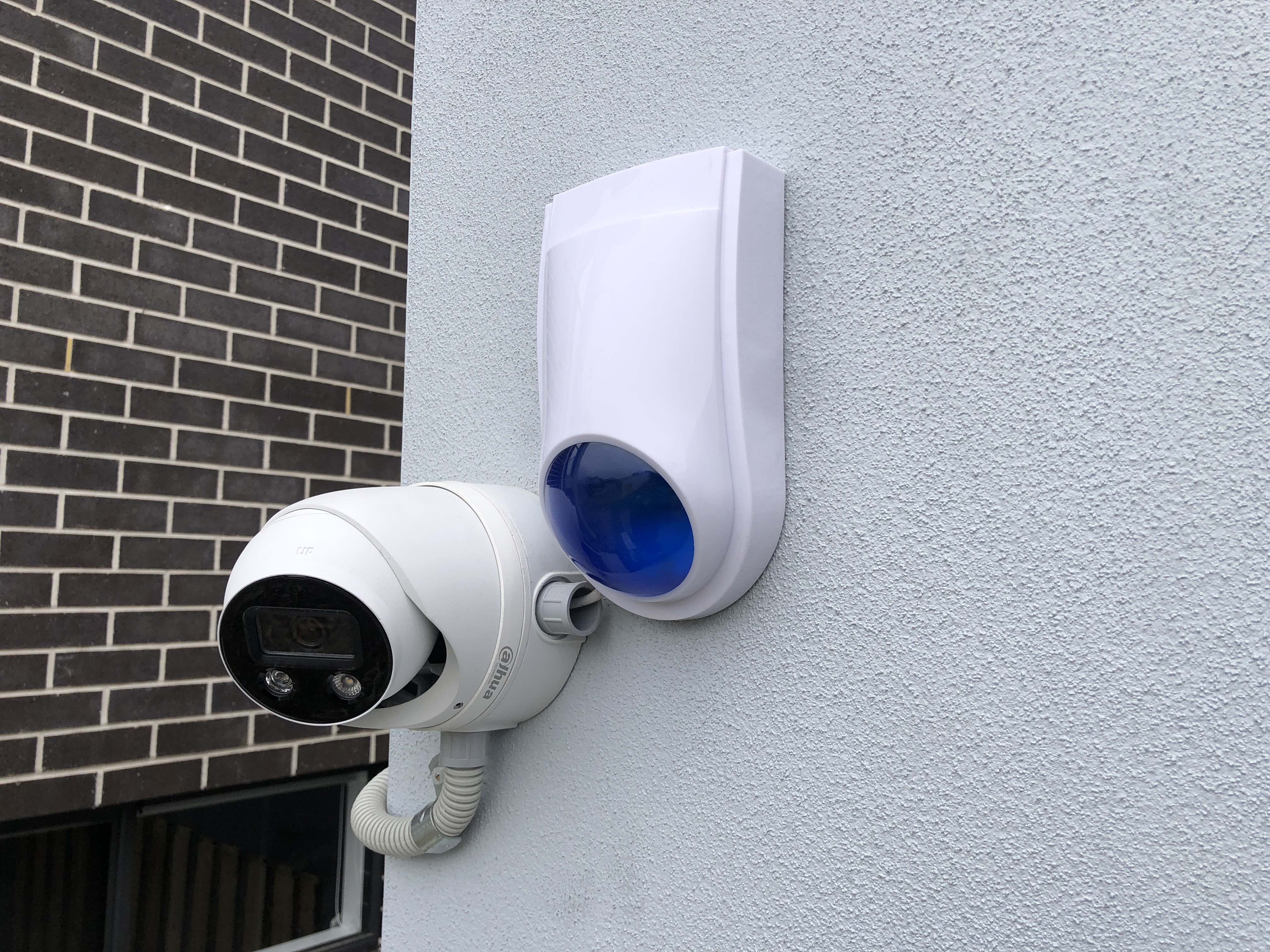 PixelTouch PTZ camera wall mounted under eave