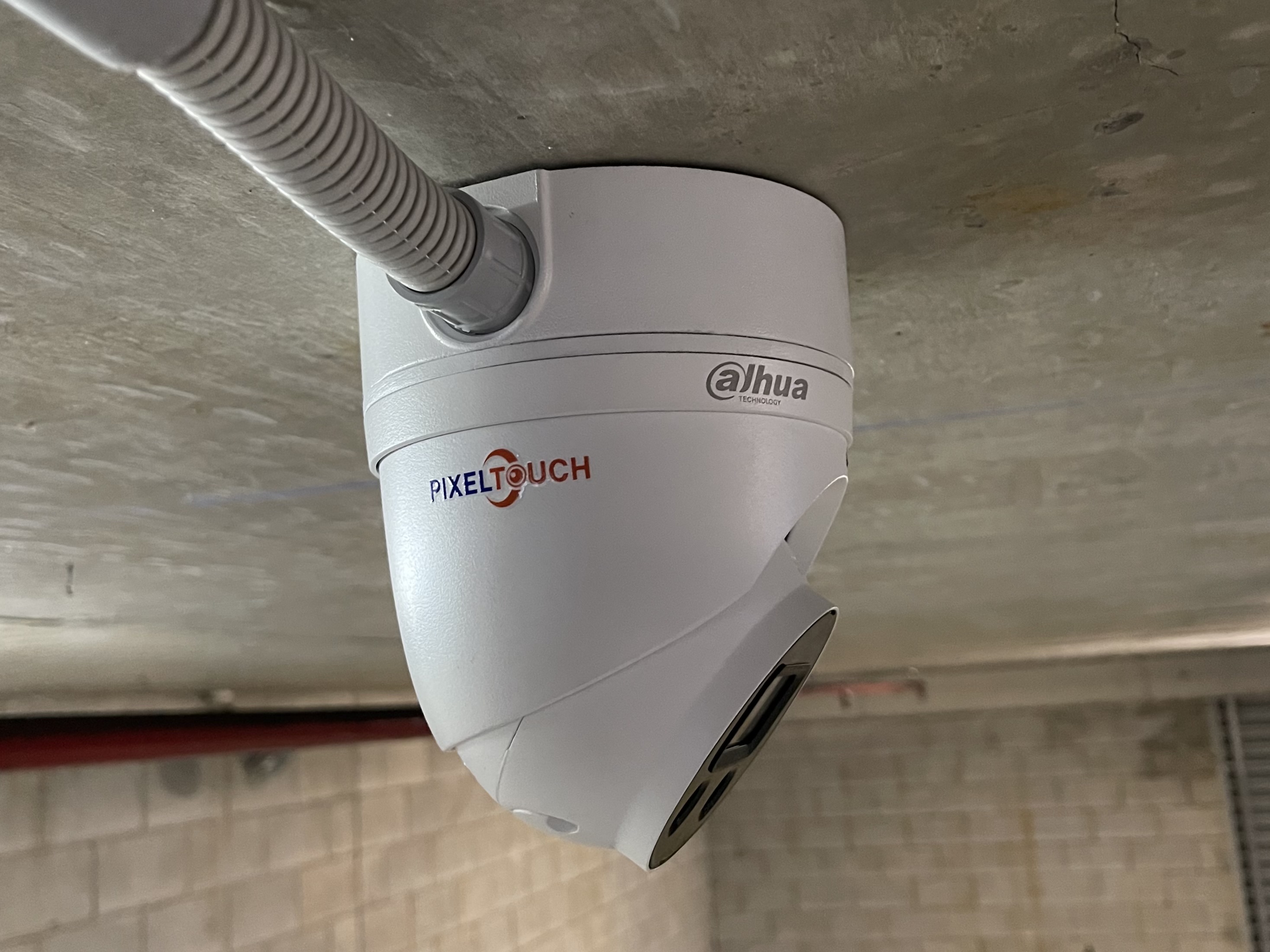 Dahua PixelTouch camera on concrete soffit ceiling