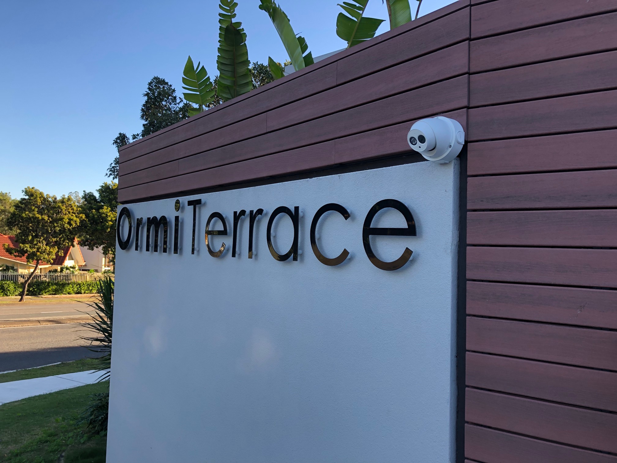 Camera on Ormi Terrace entry sign wall