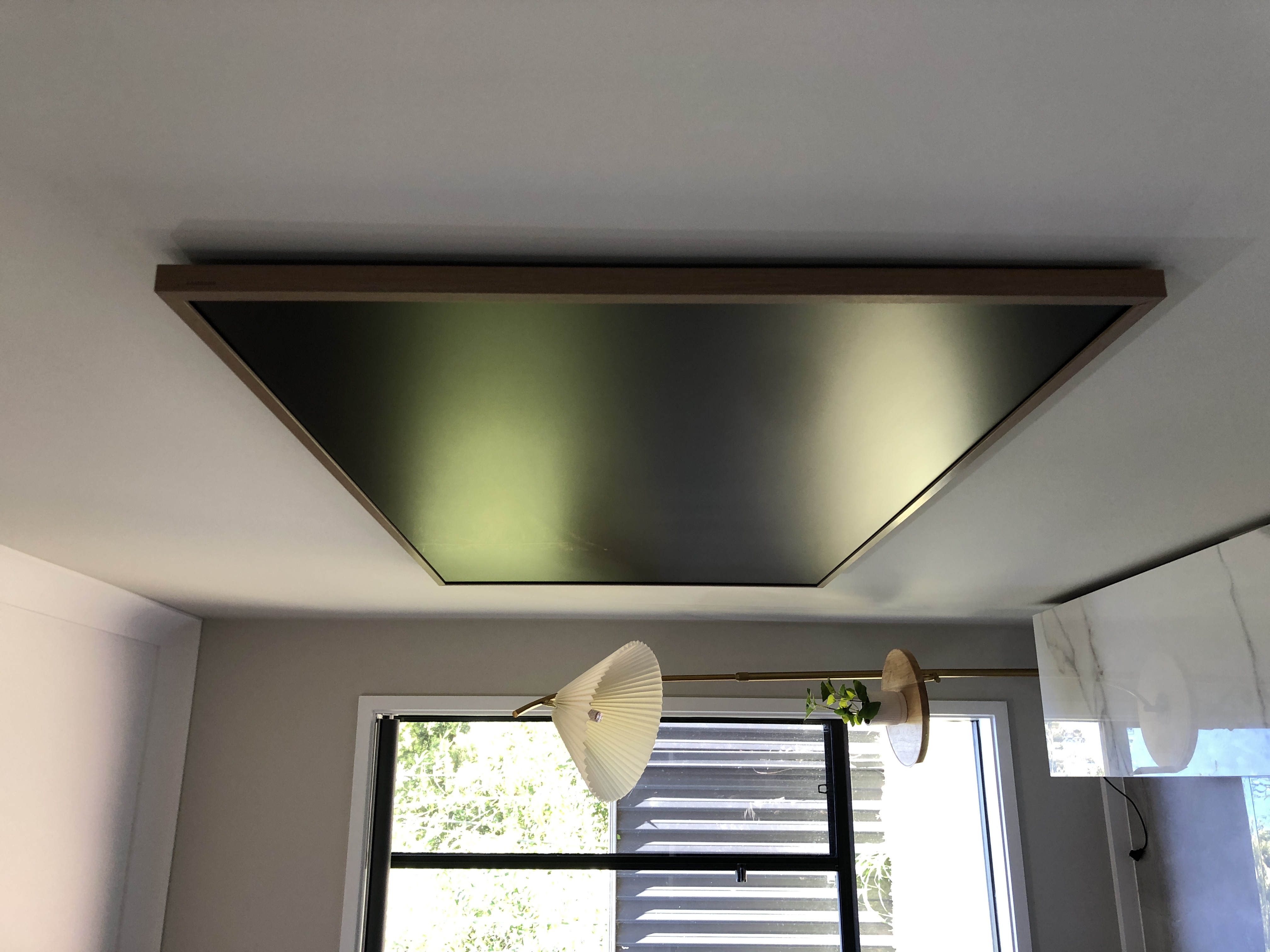 Samsung Frame TV angle view, lounge with floor lamp