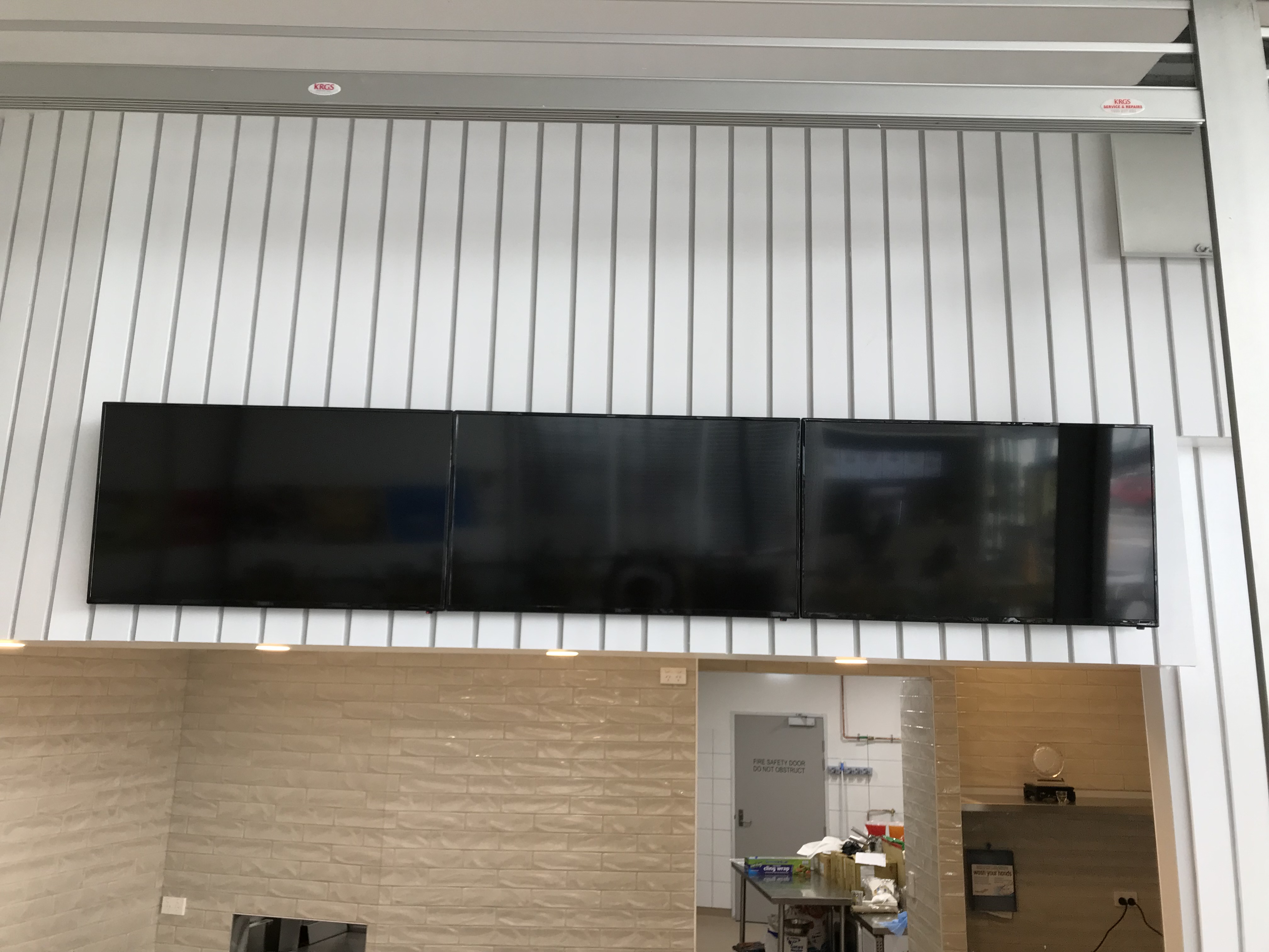 Three-screen commercial display installation