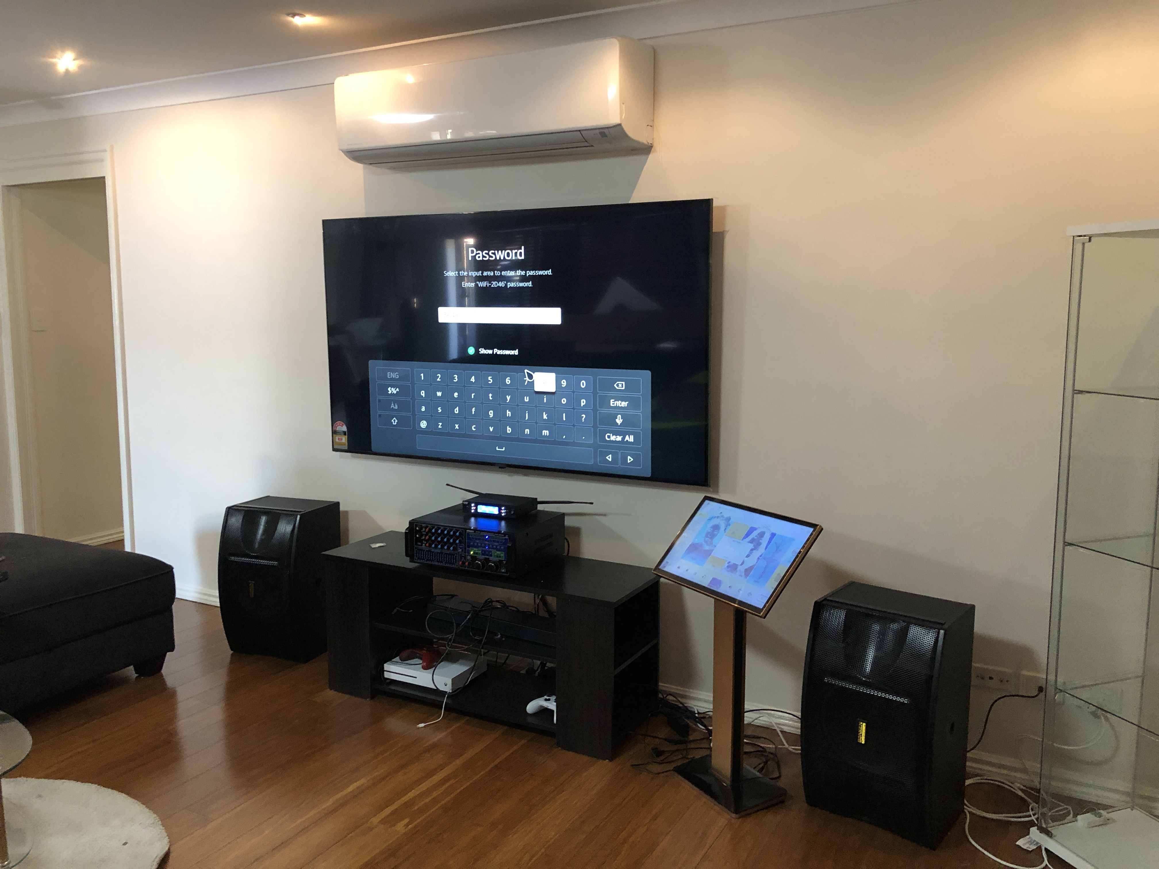 Karaoke Speakers and Wall-Mounted TV